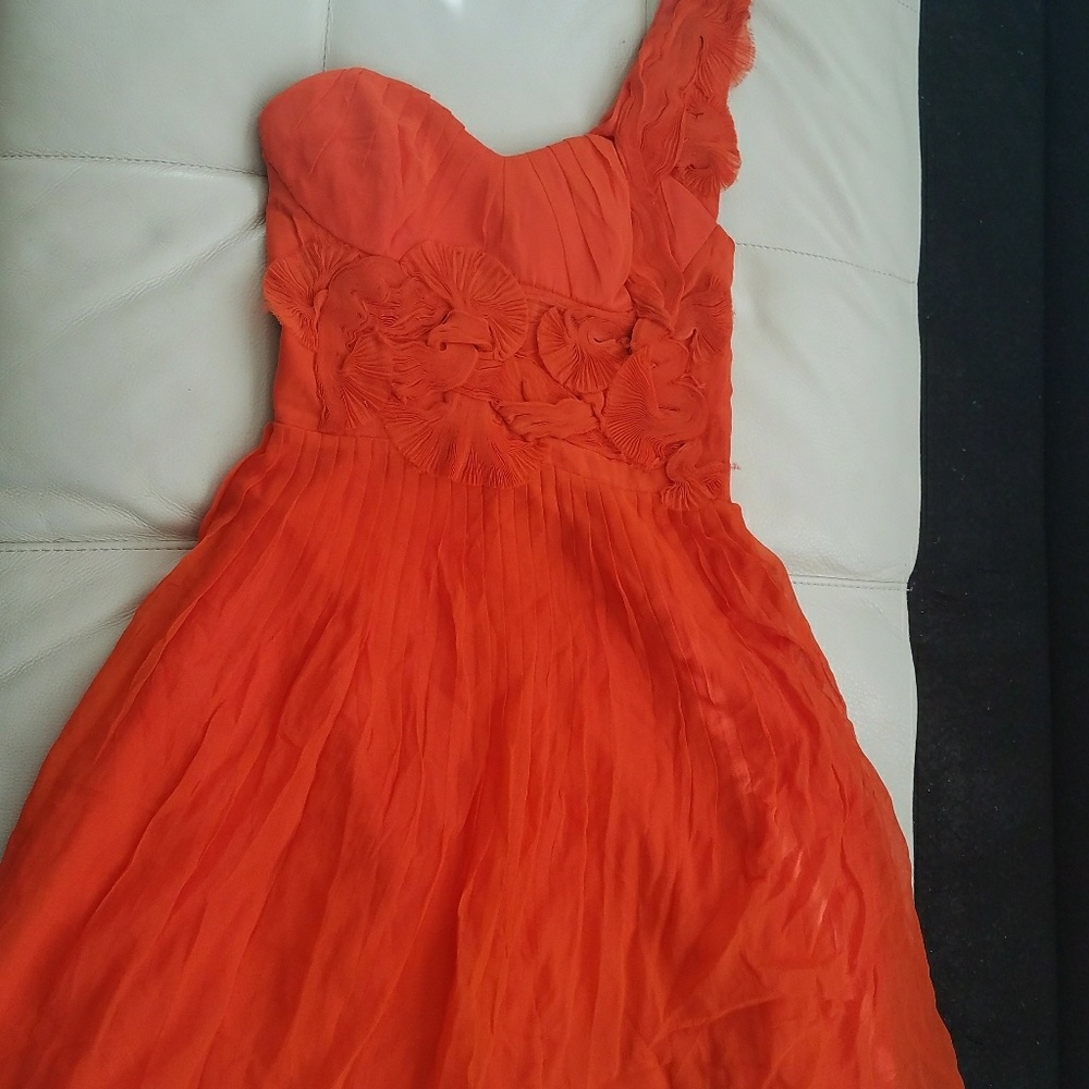Bebe orange one shoulder frill mini dress